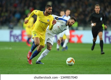 KYIV, UKRAINE - MARCH 14, 2019: Amazing Spectacular Beautiful Run With Terrific Dribbling By  Ruben Loftus­-Cheek Pressured By Tamas Kadar. Europa League. Dynamo Kyiv - Chelsea