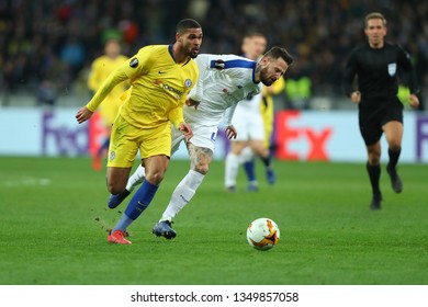 KYIV, UKRAINE - MARCH 14, 2019: Amazing Spectacular Beautiful Run With Terrific Dribbling By  Ruben Loftus­-Cheek Pressured By Tamas Kadar. Europa League. Dynamo Kyiv - Chelsea