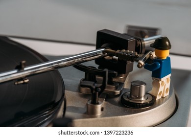 KYIV, UKRAINE - MARCH 15, 2019: close up view of plastic lego figurine fixing vinyl record player - Shutterstock ID 1397223236