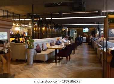 Kyiv, Ukraine, March 16, 2021, People In Cafes Sit At Tables At A Safe Distance As Quarantine Eases Due To Covid 19 Pandemic