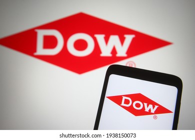 KYIV, UKRAINE - MARCH 17, 2021: In this photo illustration Dow Inc. logo of an American commodity chemical company is seen on a mobile phone and a computer screen.