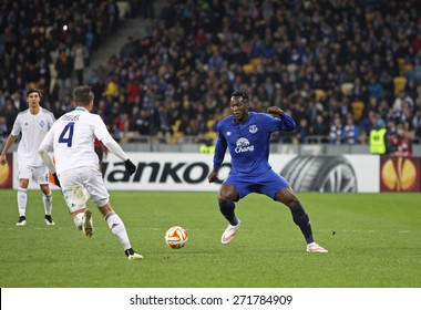 KYIV, UKRAINE - MARCH 19, 2015: Miguel Veloso of FC Dynamo Kyiv (L) fights for a ball with Romelu Lukaku of FC Everton during their UEFA Europa League game at Olympic stadium in Kyiv