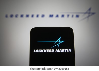 KYIV, UKRAINE - MARCH 23, 2021: In This Photo Illustration Lockheed Martin Corporation Logo Is Seen On A Mobile Phone And A Computer Screen.
