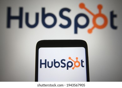 
KYIV, UKRAINE - MARCH 25, 2021: In this photo illustration HubSpot logo of an American developer and marketer of software products is seen on a mobile phone and a computer screen.