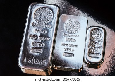 Kyiv, Ukraine - March 27, 2017:  Three Cast Bars Of Different Weight Produced At The Swiss Factory Argor-Heraeus - Is One Of The World's Largest Processors Of Precious Metals.