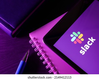 KYIV, UKRAINE - March 30, 2022. Notepad With Slack Logo Messaging App.