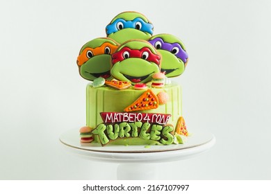 Kyiv, Ukraine - May 09, 2018: Birthday cake for a fan of Teenage Mutant Ninja Turtles on white background.