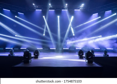 Kyiv, UKRAINE - May, 12 2020: Online Concert. Event Entertainment Concept. Background For Online Concert. Blue Stage Spotlights. Empty Stage With Blue Spotlights. Live Streaming COVID-19 Concert.