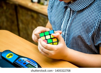 Kyiv, Ukraine, May 17, 2019, Rubik's cube in the hands of a child - Shutterstock ID 1405322708