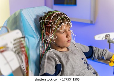 KYIV, UKRAINE - May 2020: EEG electrode placement to patient during EEG record. Electroencephalogram EEG .