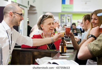 KYIV, UKRAINE - MAY 21: Meeting Of Old Friends With Glass Of Beer At The Bar Of Noisy Event During Beermaster Day Festival On May 21, 2016. Kiev Is The 8th Most Populous City In Europe.
