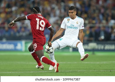 KYIV, UKRAINE - MAY 26, 2018: Casemiro Tackles The Ball In Challange With Sadio Mane. UEFA Champions League Final Real Madrid - Liverpool. Olympic NSC Stadium.