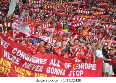 KYIV, UKRAINE – MAY 26, 2018: Liverpool football club fans sing 'You'll never walk alone' during UEFA Champions League final between Real Madrid and Liverpool. NSC Olympic stadium in Kyiv.