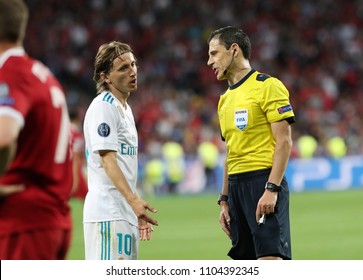 KYIV, UKRAINE - MAY 26: Luka Modric (L) of Liverpool and referee Milorad Mazic (R) discuss during the UEFA Champions League final match between Real Madrid vs Liverpool FC in Kiev, 26 May 2018