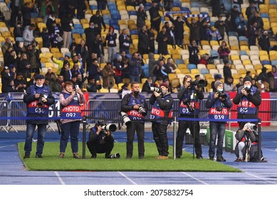 KYIV, UKRAINE - NOVEMBER 2, 2021: Sport Photographers At Work Seen During The UEFA Champions League Game Dynamo Kyiv V Barcelona At NSC Olimpiyskyi Stadium In Kyiv