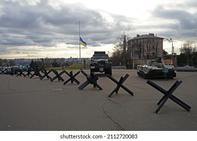 Kyiv, Ukraine - November 22 2021: Ukrainian and Russian war weapons, tanks and transporters on display in front of flag post