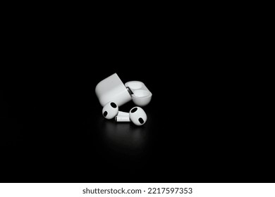 Kyiv, Ukraine - October 14, 2022: Apple AirPods (3rd Generation). True Wireless Earphones, Earbuds From Apple. White Apple AirPods 3 With Spatial Audio On Black Background