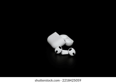 Kyiv, Ukraine - October 14, 2022: Apple AirPods (3rd Generation). True Wireless Earphones, Earbuds From Apple. White Apple AirPods 3 With Spatial Audio On Black Background