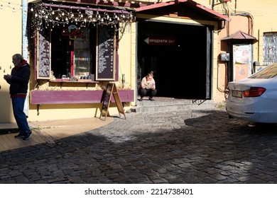 Kyiv, Ukraine - October 15 2022: Street In The Old Town With Hole In The Wall Cafe