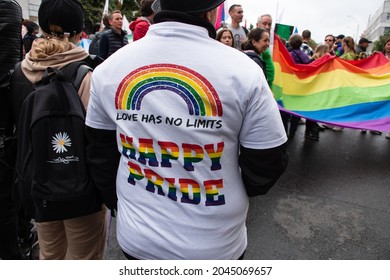 Kyiv, Ukraine - September 19, 2021: Back of a man wearing a white T-Shirt with slogans Love Has No Limits and Happy Pride