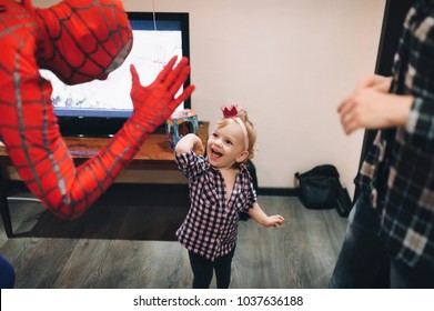 Kyiv, Ukraine - September, 2017. High Five Concept. A Man In A Spiderman Costume Came To Congratulate The Child On His Birthday. Spiderman Costume Rental.