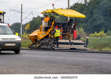 3 Pavers Laying Asphalt On The New Motorway - YouTube
