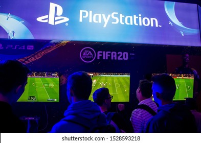 Kyiv, Ukraine - September 28, 2019: The guys are playing a FIFA 20 video game on ps4.