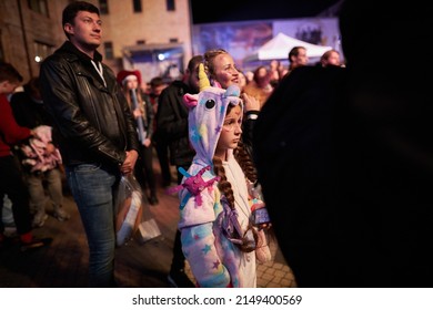 Kyiv, Ukraine September 4: Comic Con 2021, Fandom Festival In Kyiv, Ukraine. A Little Girl In A Unicorn Pajama Costume Stands In A Crowd Of People.