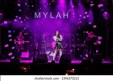 KYIV-1 FEBRUARY,2019: Famous r&b singer Mylah performing on stage in night club.Popular African American artist singing live on concert in music hall