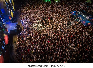 KYIV-25 MAY,2019: Summer Music Festival Crowd Partying To Famous Dj At Night.Radio Day Festival Event Shot From Above With Aerial Drone Camera.Popular Entertainment Event For Youth