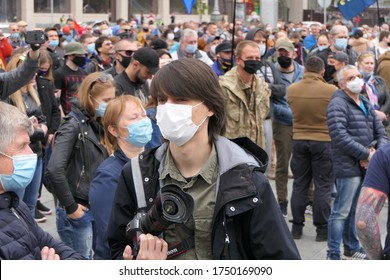 Kyiv/Ukraine - 05.29.2020: Crowd Of Protesting People Demonstrate On The City Street. Photographer Or Camera Man Work At The Site. Lot Of People With Face Covered By Protection Mask Due To Coronavirus