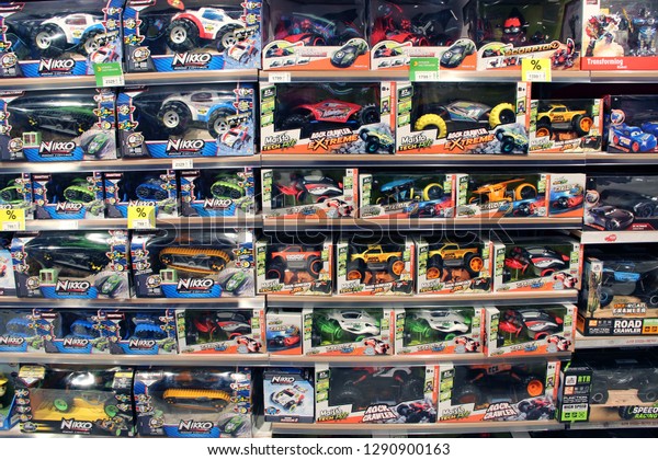 Kyiv/Ukraine. 28\
September 2018: Shop toys. Toy store. Inside toy shop. Rows of\
shelves with toys. Wide selection of toys. Shop for children. Cars\
for boys. Inside toy shop of model\
cars
