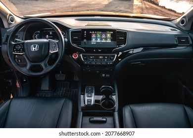 Kyiv,Ukraine - Ocrober 2021: Honda Pilot steering wheel and dashboard. Photoshoot