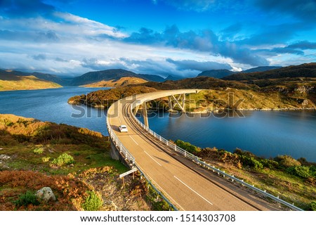 The Kylesku Bridge spanning Loch a' ChÃ irn BhÃ in in the Scottish Highlands and a landmark on the North Coast 500 tourist driving route