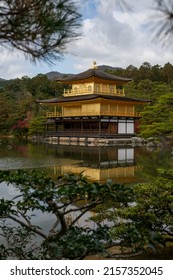 The Kyoto Golden Temple Shrine Kinkaku-Ji Captured From Trees