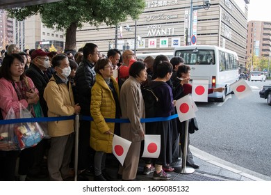 Kyoto, Japan- 27 Nov, 2019: Crowds With Paper Flags Waiting For The Japanese Emperor Akihito And His Family In Kyoto.