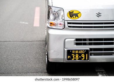 Kyoto, Japan - April 17, 2019: Downtown District Area With Closeup Of Delivery Truck Van With Cat Logo And License Plate On Street Road In Urban Town For Famous Yamato Company