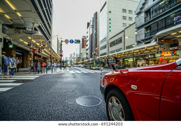 KYOTO JAPAN - JUL,18,2017: Cars on the street of\
Kyoto in Japan. Kyoto Metropolis is one of the most populous city\
of Japan.