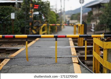 KYOTO, JAPAN - MAR 31, 2017: Close up of the boom barrier of the railway barrier rail gates