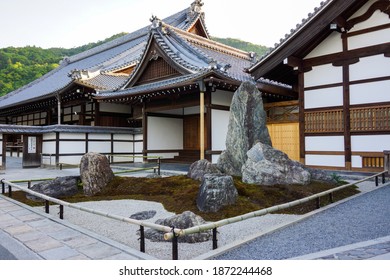 Kyoto, Japan - May 2014: Japanese Zen Stone Garden At The Front Of Kuri Hall (temple Office And Kitchen) In The Tenryu-ji Temple Complex, Arashiyama. No People. Clear Blue Sky. 