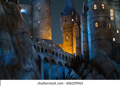 KYOTO, JAPAN - NOVEMBER 17, 2016 : Night scene close up of Hogwarts castle the school of wizardry in Harry Potter movies in Universal Studios Japan