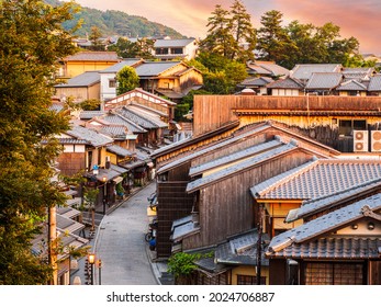 Kyoto, Japan: Twilight view of the popular tourist spot in Higashiyama district, Ninenzaka. The historic stone-paved street lined with wooden built souvenir shops, teahouses, restaurants, etc.