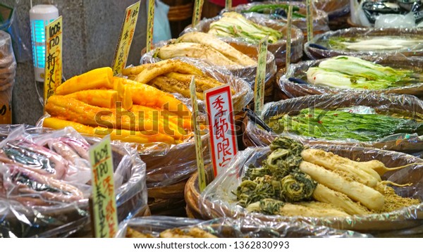 KYOTO,\
KYOTO PREFECTURE, JAPAN - DECEMBER 31, 2017; Different types of\
Japanese preserved vegetables, known as tsukemono, from Uchida\
Tsukemono Nishikikoji Shop in Nishiki\
Market.