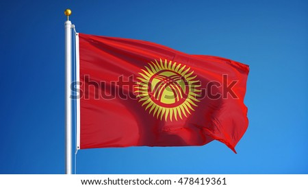 Kyrgyzstan flag waving against clean blue sky, close up, isolated with clipping path mask alpha channel transparency