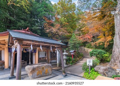 Kyushu, Japan - December 08 2021: Japanese Shinto Censer Of Fudo Jinja Shrine Part Of One Of The Eight Okunomiya Hassha Shrines In Miyajidake Shrine In Fukuoka During The Momiji Season In Autumn.