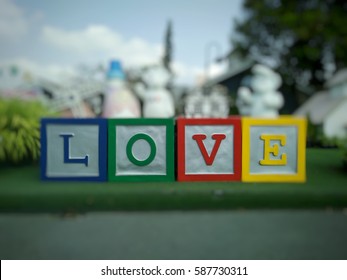 L o v e letter boxes colorful  blur background
