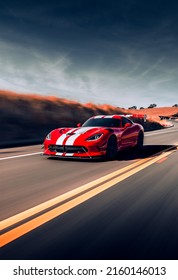 LA, CA, USA
November 2, 2021
Dodge Viper ACR In Red With White Racing Stripes On The Highway With Sky Overhead