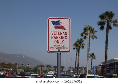 LA, California /USA - June 17 2019 : Red, White And Blue Veteran Parking Only Sign, With Thankyou For Your Service. Located In A Parking Lot On A Sunny Day With Palm Trees In The Background