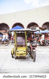 LA CARLOTA CITY, PHILIPPINES - Feb 01, 2019: A Busy City Street With Tricycles And Motorbikes In The Philippines