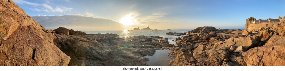 La Corbiere lighthouse, Jersey, U.K. Coastal landark at sunset on a very mild November day. - Shutterstock ID 1862106757